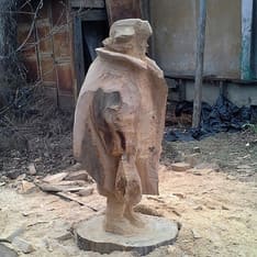 modern figurative wood sculpture Homeless