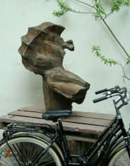 modern figurative wooden sculpture The Wind